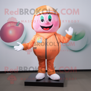 Peach Bracelet mascot costume character dressed with a Vest and Foot pads