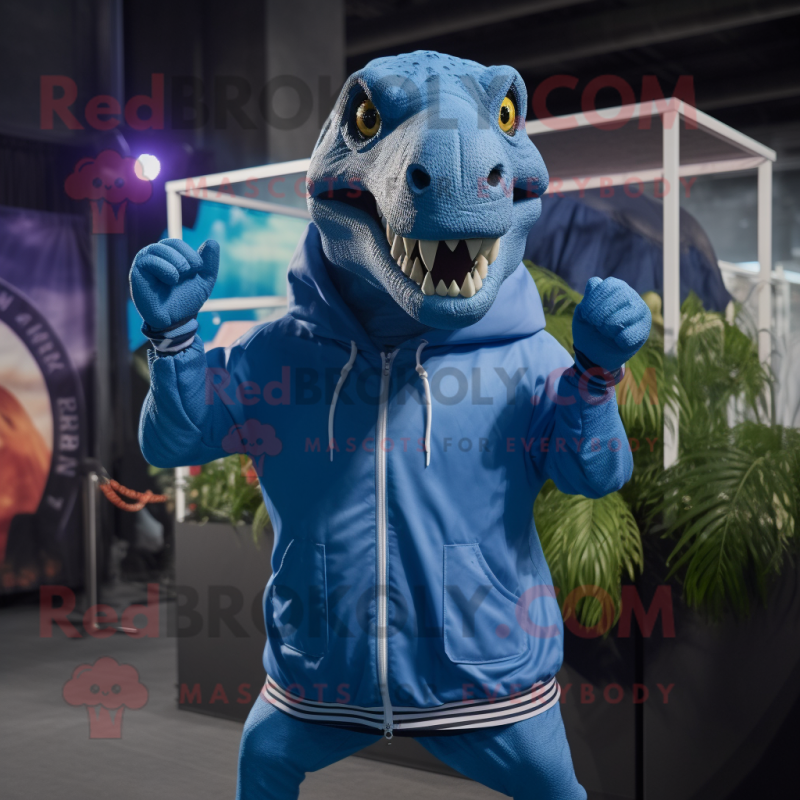 Blue T Rex mascot costume character dressed with a Windbreaker and Bracelets