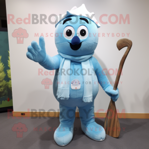 Sky Blue Ice mascot costume character dressed with a Dungarees and Shawl pins