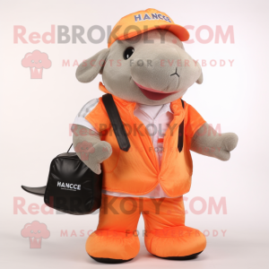 Peach Humpback Whale mascot costume character dressed with a Vest and Messenger bags