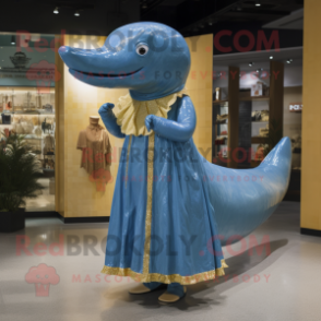 Gold Blue Whale mascot costume character dressed with a Dress and Rings