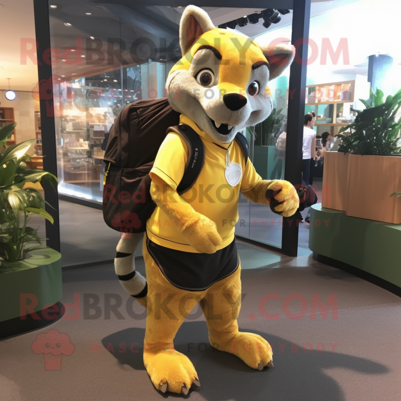 Yellow Thylacosmilus mascot costume character dressed with a Yoga Pants and Backpacks