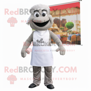 Gray Falafel mascot costume character dressed with a Polo Shirt and Suspenders