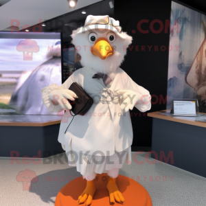 nan Gull mascot costume character dressed with a Blouse and Coin purses