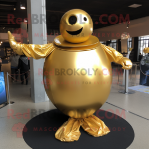 Gold Human Cannon Ball mascot costume character dressed with a Wrap Skirt and Anklets