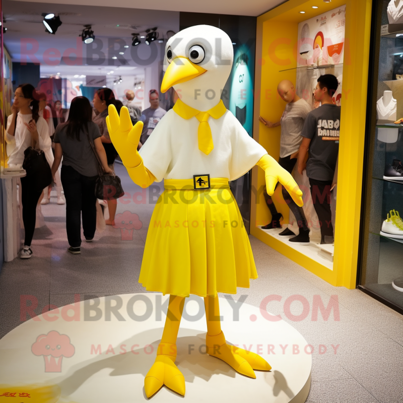 Yellow Albatross mascot costume character dressed with a Mini Skirt and ...