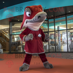 Maroon Dolphin maskot...