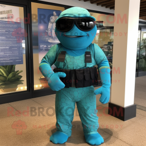 Turquoise Marine Recon mascot costume character dressed with a Swimwear and Bracelets