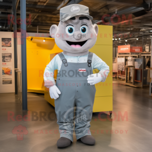 Gray Candy Box mascot costume character dressed with a Dungarees and Tie pins