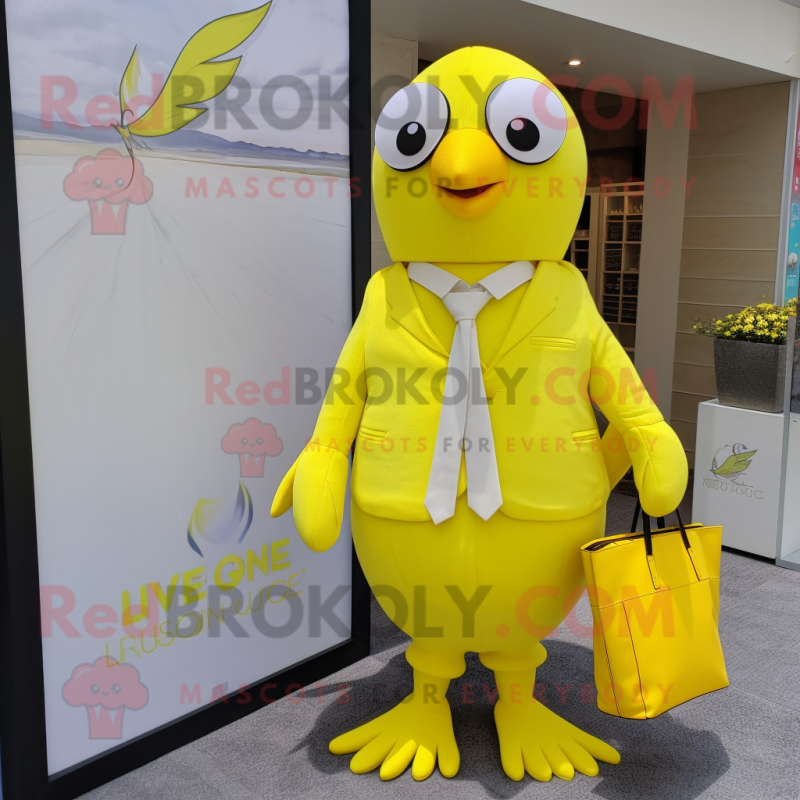 Lemon Yellow Dove mascot costume character dressed with a Suit and Tote bags