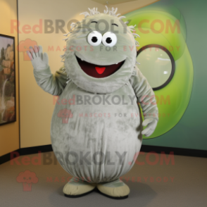 Silver Cucumber mascot costume character dressed with a Corduroy Pants and Rings