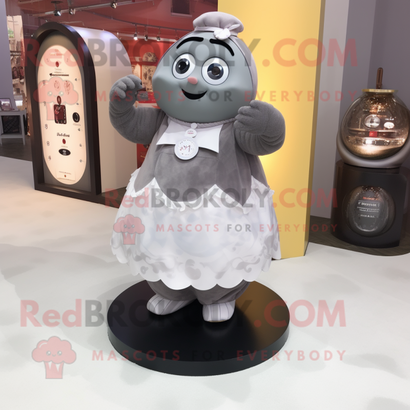 Gray Chocolates mascot costume character dressed with a Maxi Skirt and Bracelet watches