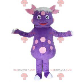 Dinosaurusmascotte met stippen. Paars schepsel mascotte -