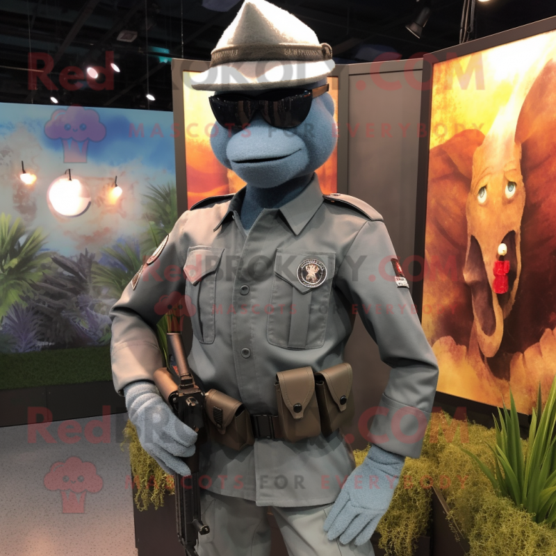 Gray Commando mascot costume character dressed with Boyfriend Jeans and Lapel pins