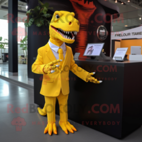 Yellow T Rex mascot costume character dressed with Suit Jacket and Keychains