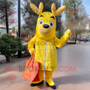 Lemon Yellow Elk mascot costume character dressed with Hoodie and Tote bags