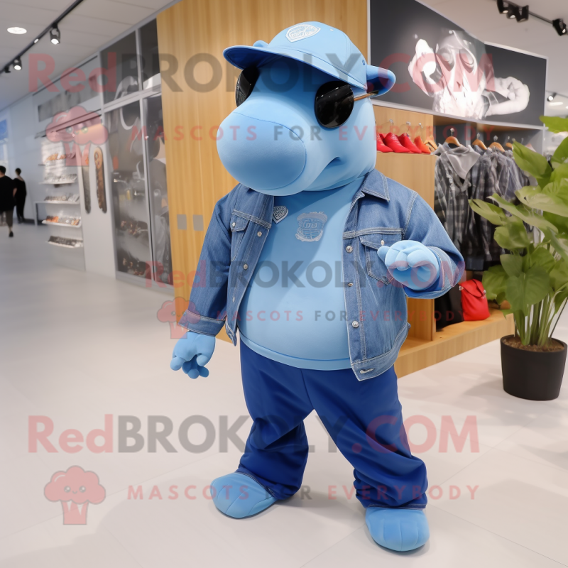 Sky Blue Tapir mascot costume character dressed with Flare Jeans and Caps