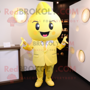 Yellow Dim Sum mascot costume character dressed with Suit Jacket and Cufflinks