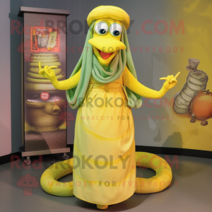 Lemon Yellow Snake mascot costume character dressed with a Maxi Dress and Caps