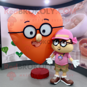 Peach Heart Shaped Balloons mascot costume character dressed with a Cargo Shorts and Eyeglasses