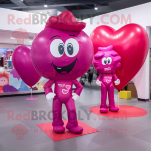 Magenta Heart Shaped Balloons mascot costume character dressed with a Jeggings and Messenger bags