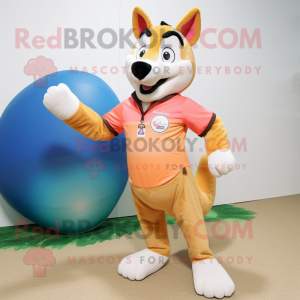 Peach Dingo mascot costume character dressed with a Rash Guard and Tie pins