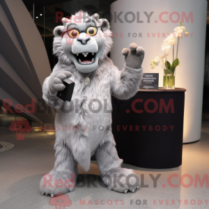 Silver Smilodon mascot...