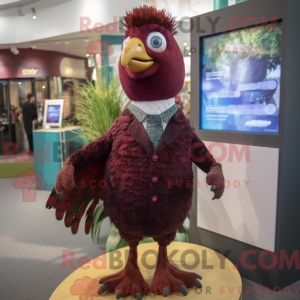 Maroon Peacock mascot...