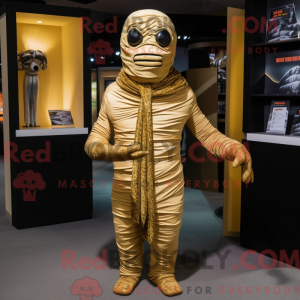 Gold Mummy mascot costume...