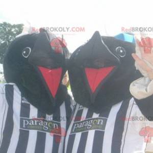 2 mascottes de taupes d'ours noir en tenue de sport -
