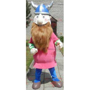 Bearded Viking maskot kledd i rosa med hjelm - Redbrokoly.com