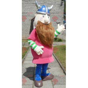 Bearded Viking maskot kledd i rosa med hjelm - Redbrokoly.com