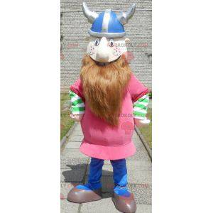 Bearded Viking maskot kledd i rosa med hjelm - Redbrokoly.com