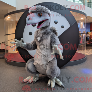 Grå Deinonychus...