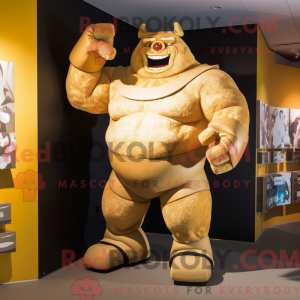 Gold Strongman mascot...