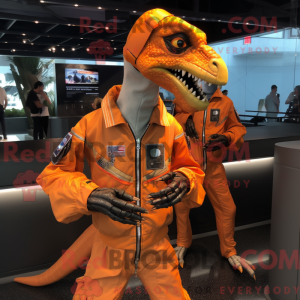 Orange Velociraptor maskot...