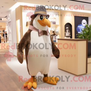 Mascotte de pingouin beige...