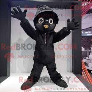 Mascotte de trapéziste noir...