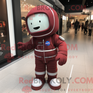 Maroon Astronaut mascot...