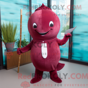 Maroon Narwhal maskot...