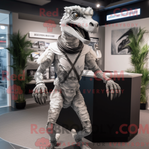 Silver Deinonychus mascot...