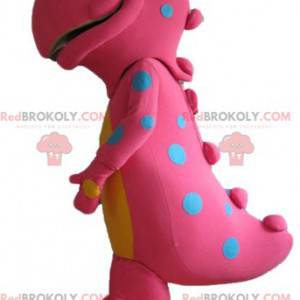 Mascota dinosaurio rosa y amarillo grande con puntos azules -