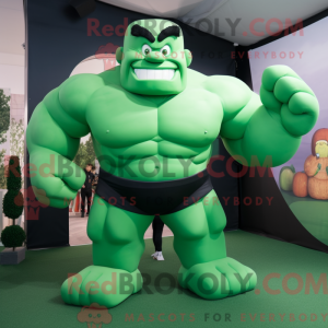 Grøn Strongman maskot...