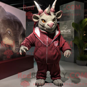 Maroon Triceratops mascot...