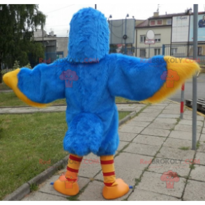 Blauwe en gele vogel mascotte. Adelaar mascotte - Redbrokoly.com