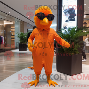 Postava maskota oranžového...