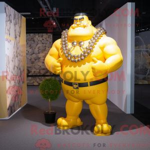 Yellow Strongman mascot...