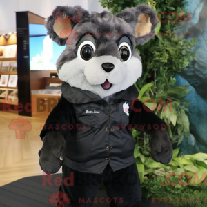 Sort flyvende egern maskot...