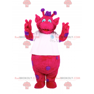 Fuchsia character mascot with purple spots - Redbrokoly.com