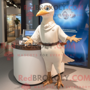 Béžová postava maskota Dove...